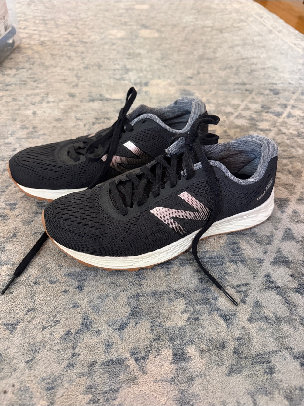 New Balance Fresh Foam Black Athletic Sneakers with Pink Logo Accents